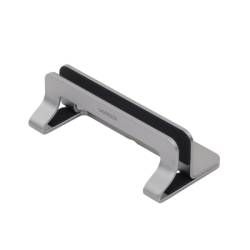 Soporte Vertical para Laptop / Adecuado para escritorio / Anchura Ajustable (12-26mm) / Amplia compatibilidad / Anti-Arañazos / Anti-Deslizante /Ajustable Mediante Tornillos / Color Plata / Aluminio + Silicona